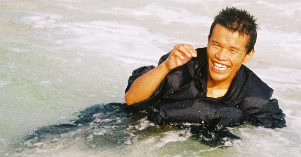 Swimming in hiking poncho